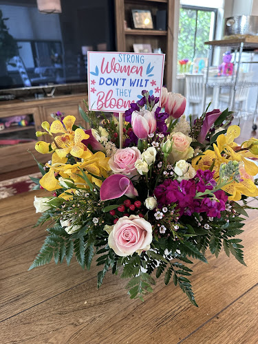 Between Flowers Design